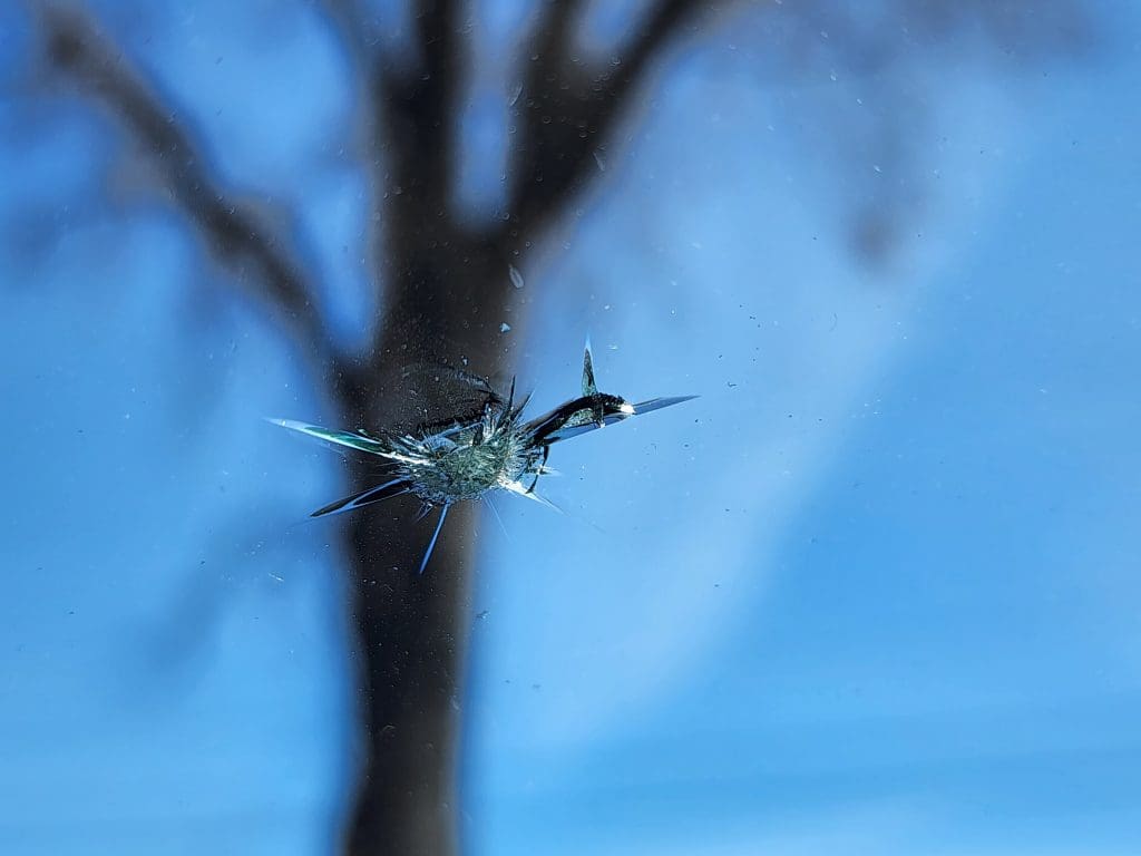 a picture of a windshield replacement. How much does a windshield replacement cost?